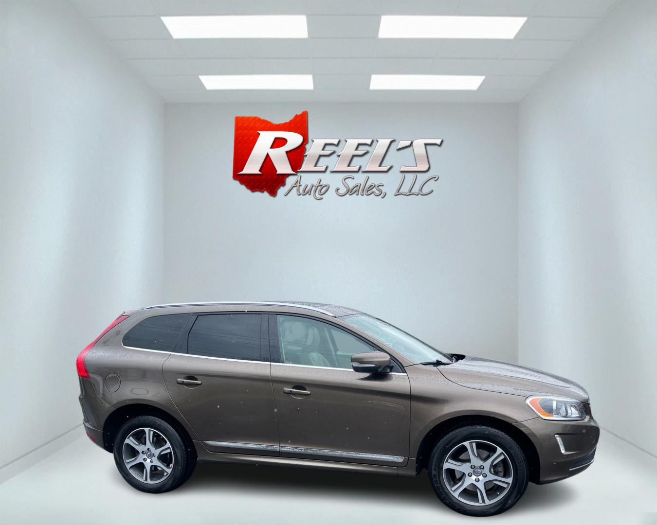 2015 Brown /Tan Volvo XC60 T6 Premium Plus (YV4902RC5F2) with an 3.0L I6 24V DOHC Turbo engine, 6-Speed Automatic transmission, located at 11115 Chardon Rd. , Chardon, OH, 44024, (440) 214-9705, 41.580246, -81.241943 - Photo#3